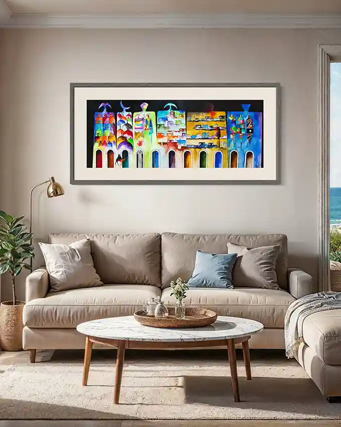 Living room with art print Ancient Tablets on the wall above a beige sofa. by Sudanese artist Yousif Ibrahim, in UAE