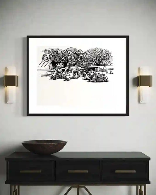 Desert Caravan at Rest art print by Obada Gabir displayed in black frame above modern console table with brass accents
