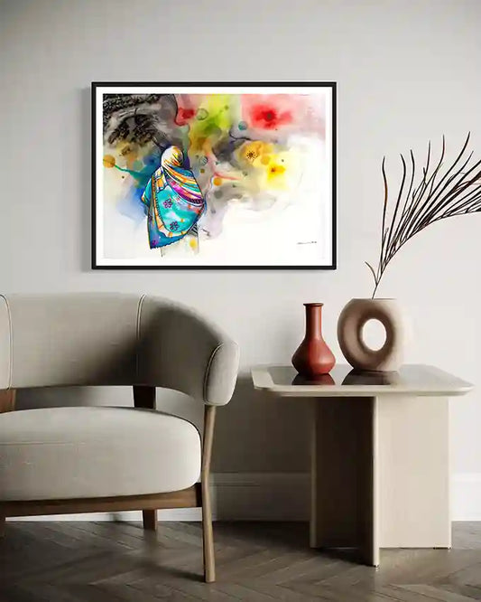 Framed art print By Sudanese Artist Galal Yousif size 100x74 cm on a wall above a sofa with decorative vases on a table.UAE