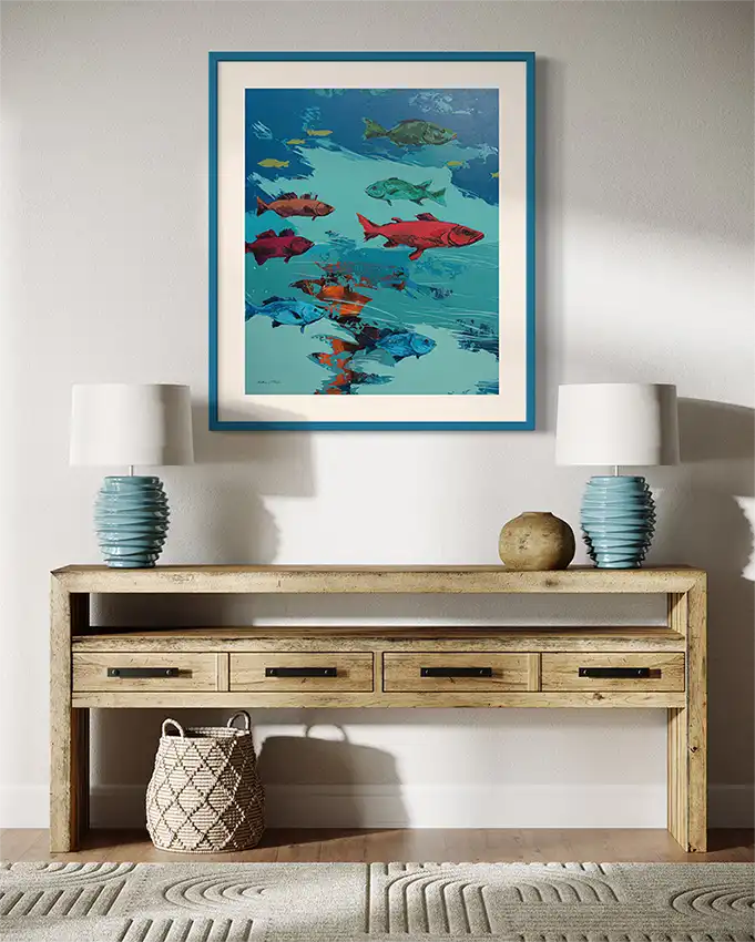Coccyx 6 by Bakri Moaz framed underwater fish art print mockup in coastal interior with blue frame and wooden console