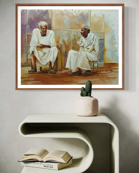 Between Old Friends framed watercolor by Hussein Merghani above white console with cactus plant home decor mockup