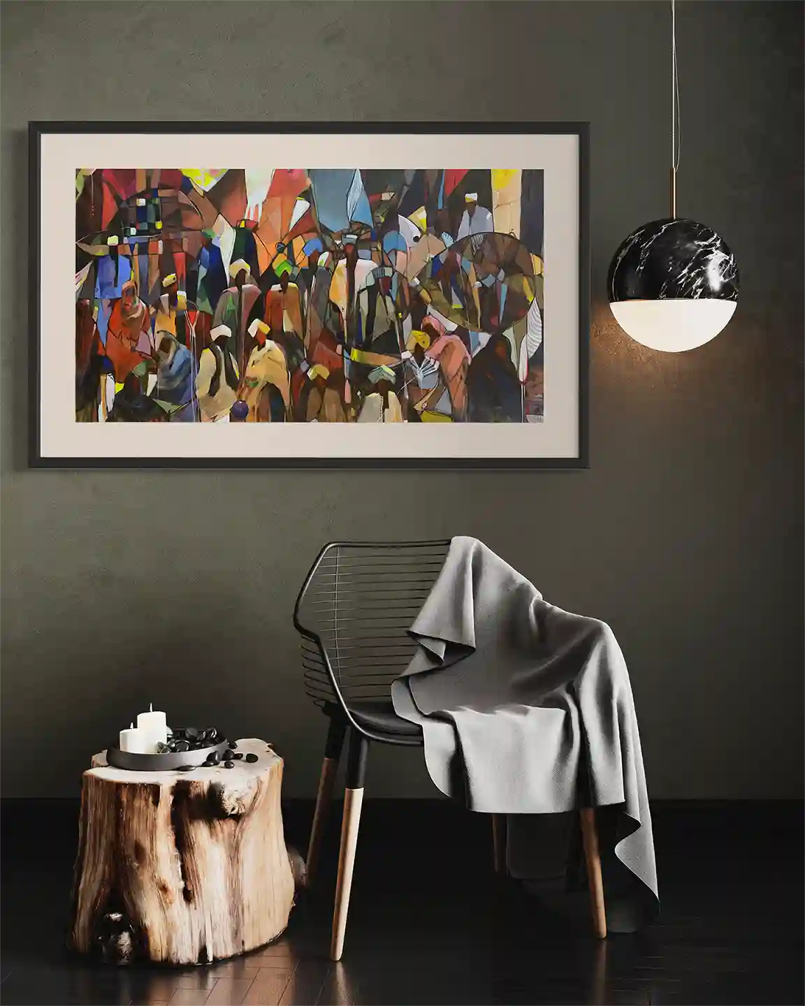 Conversations in Color framed print by Omer Kamal in modern room with black chair, wood stump table and marble wall light