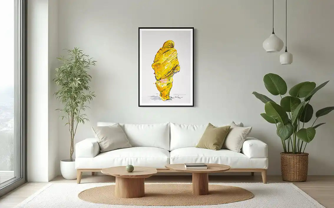 Daughters of the Nile 2 framed art print above white sofa in bright living room with plants and pendant lights