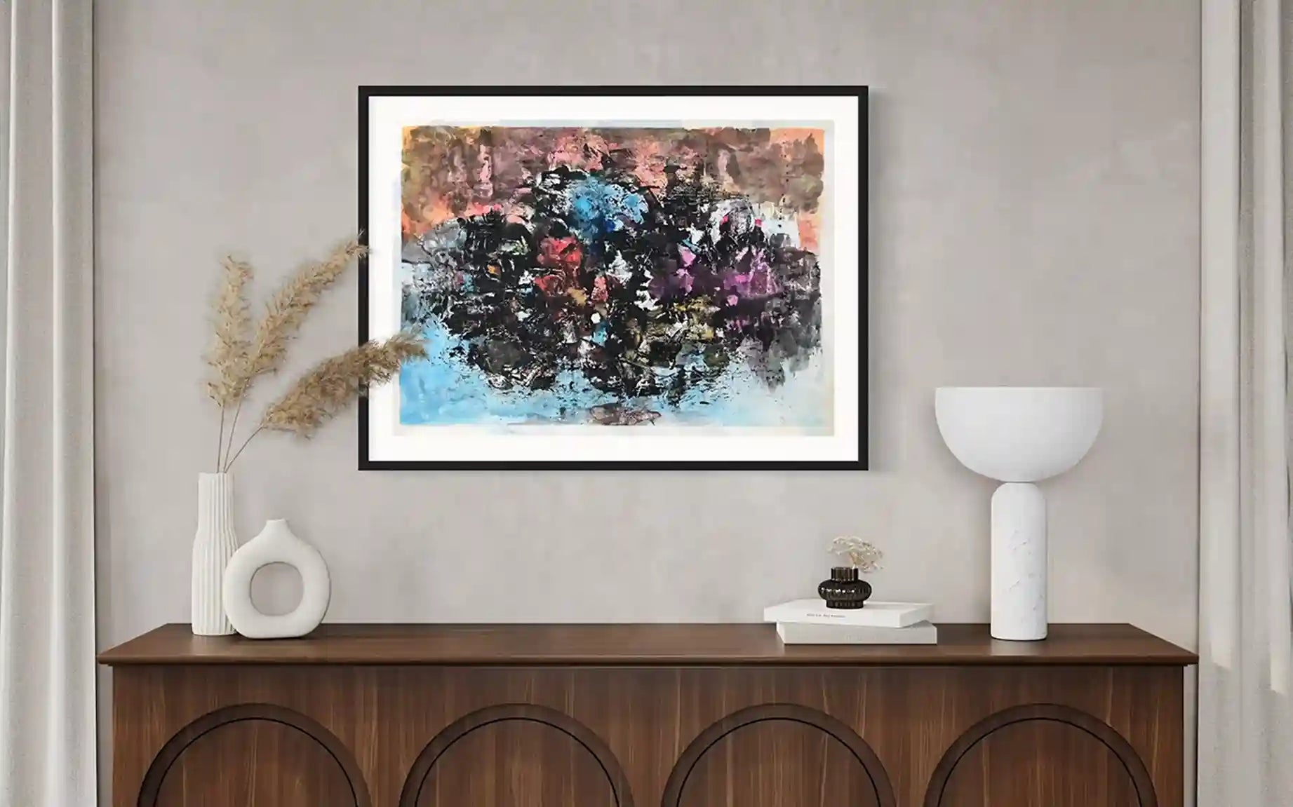 Divination painting by Samir Shareef in black frame above wood console with white vases and dried flowers interior mockup