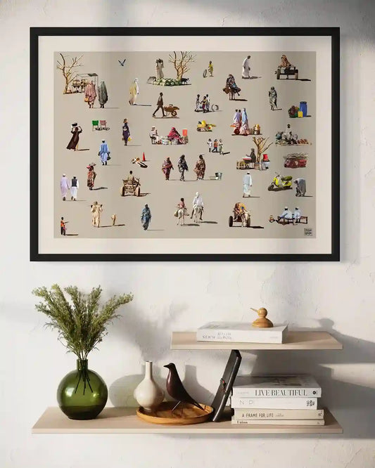 Friday Market digital collage print displayed in black frame on white wall above modern floating shelves with decor