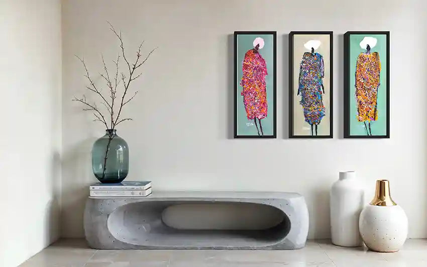 Hani Khalil Sufi series three vertical art prints displayed as triptych in black frames above modern bench