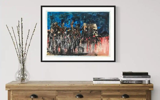 In Saturn painting by Samir Shareef in black frame on beige wall above wooden console with vase and books interior mockup