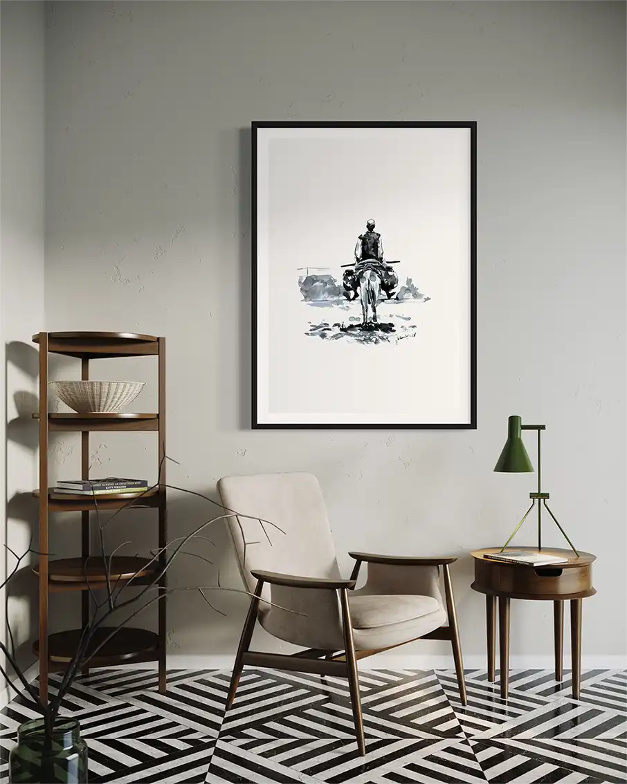 Lone Rider art print by Elamin Awad displayed in modern living room with mid-century furniture and geometric rug