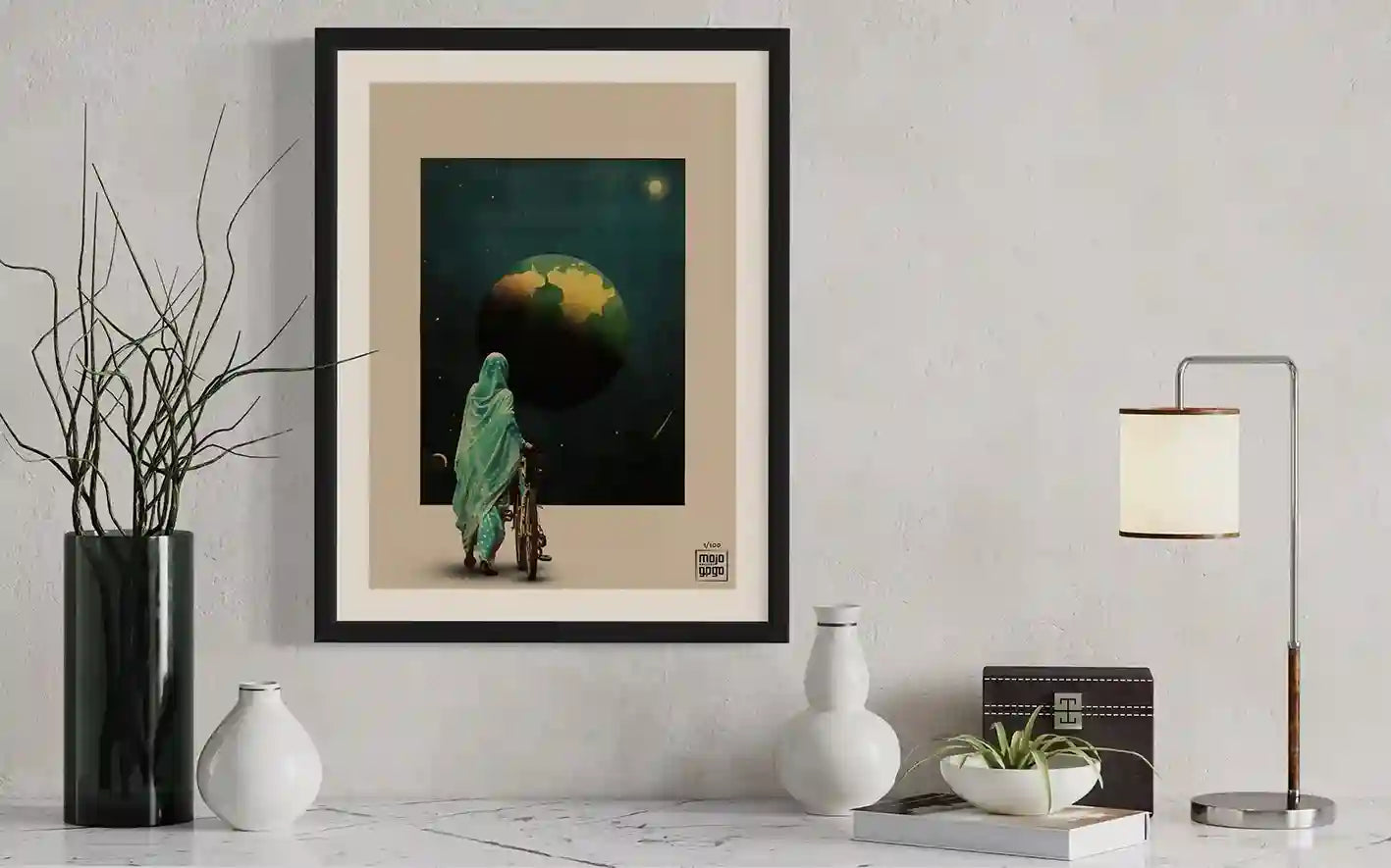 Mad World digital collage print in black frame on white wall above marble console with modern decor