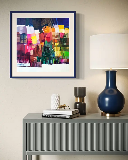 Market Mosaic framed art print by Rafat Omar displayed above gray console table with navy lamp in modern interior mockup