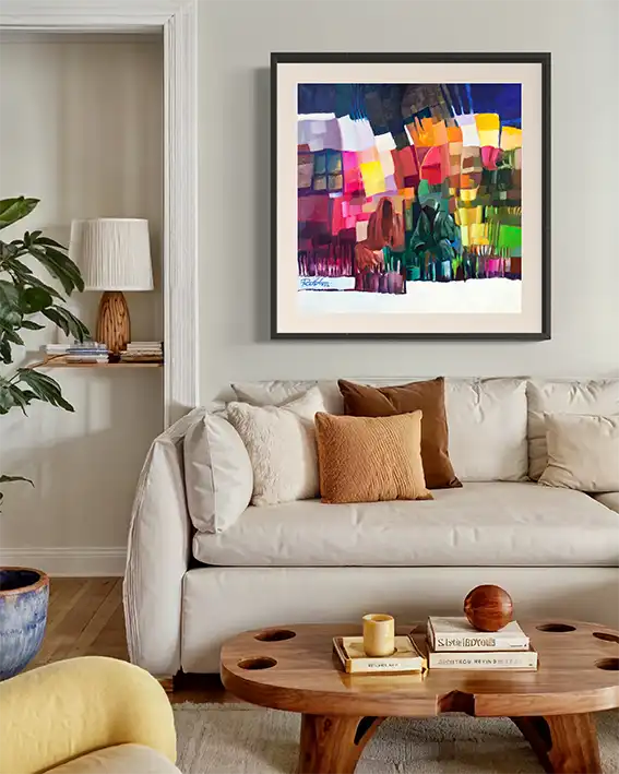Market Mosaic art print by Rafat Omar in black frame above beige sofa with orange pillows in neutral living room mockup