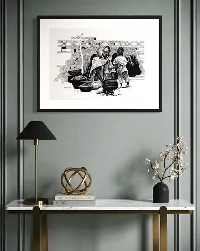 Obada Gabir black and white art print in modern home with black frame, showing mother and child scene, contemporary wall art