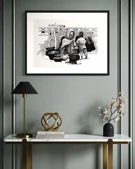 Obada Gabir black and white art print in modern home with black frame, showing mother and child scene, contemporary wall art