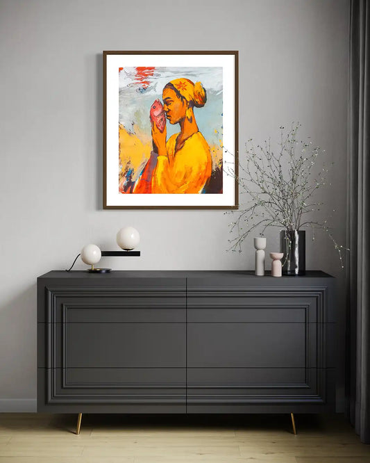 Starring 3 figurative painting by Abubakar Moaz displayed above black dresser with modern lamps and dried flowers mockup