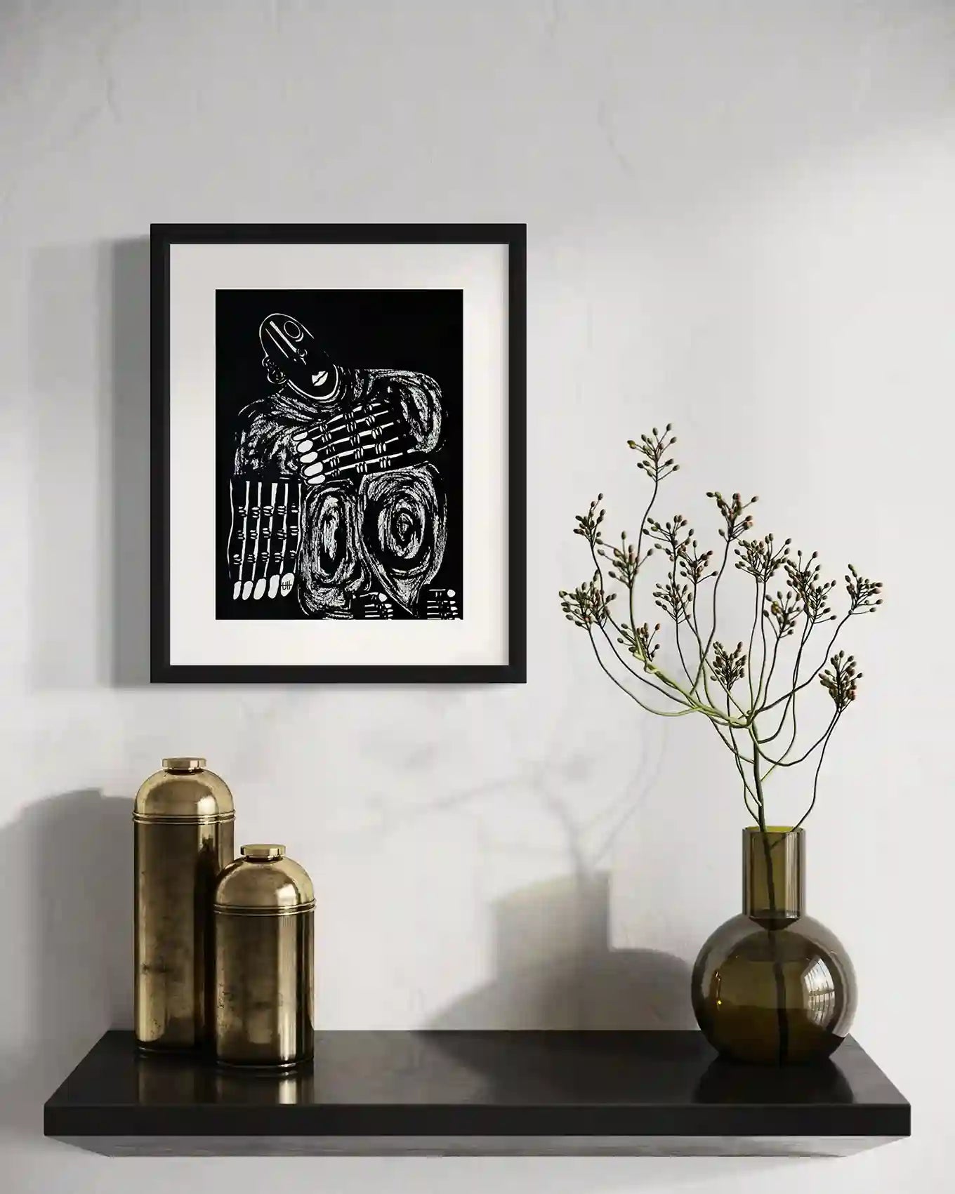 Static by Usra Hamza framed art mockup on wall with minimalist decor, showing bold black and white ink on paper composition