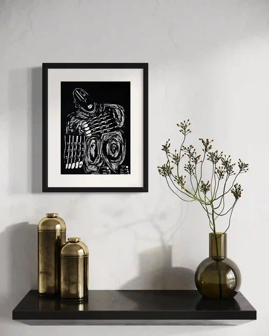 Static by Usra Hamza framed art mockup on wall with minimalist decor, showing bold black and white ink on paper composition