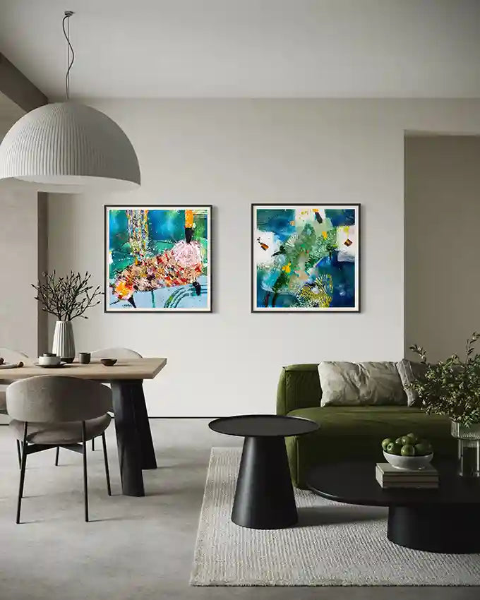 Sufi 10 & Sufi 11 art prints by Hani Khalil as gallery wall in modern dining room with olive green sofa and minimalist decor