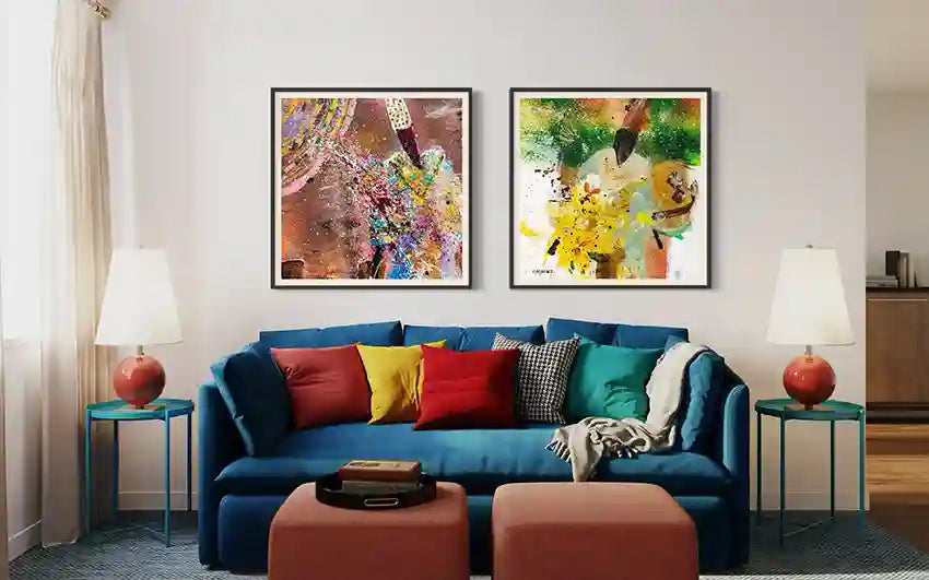 Sufi series abstract art by Hani Khalil above navy blue sofa with colorful pillows in eclectic living room - vibrant decor