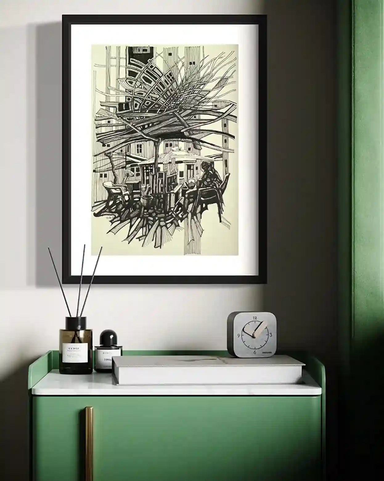 Tea Lady framed art by Obada Gabir displayed in modern green interior, Sudanese ink drawing home decor wall art mockup