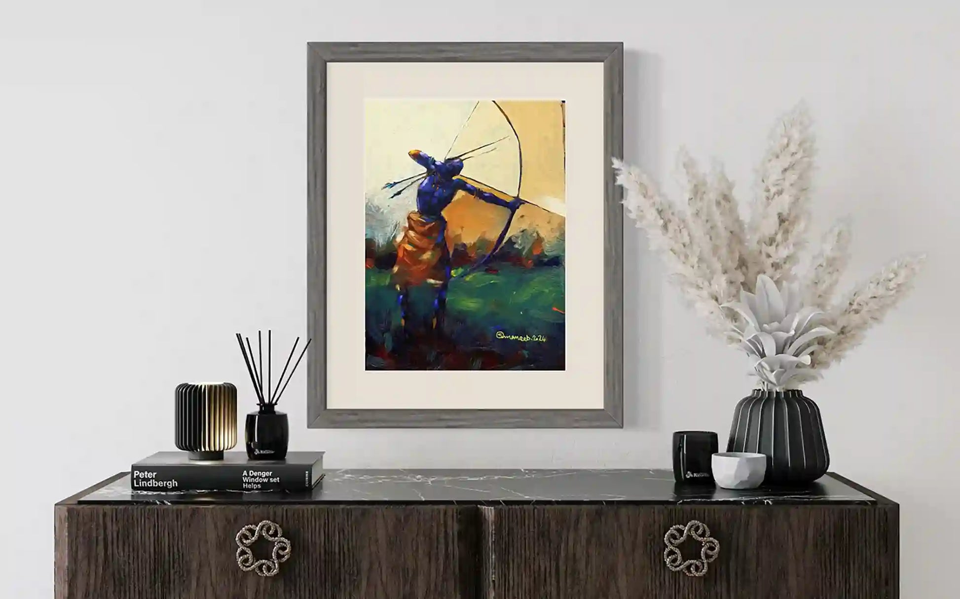 The Hunter original acrylic painting by Osman Adam displayed in modern interior setting with decorative accessories