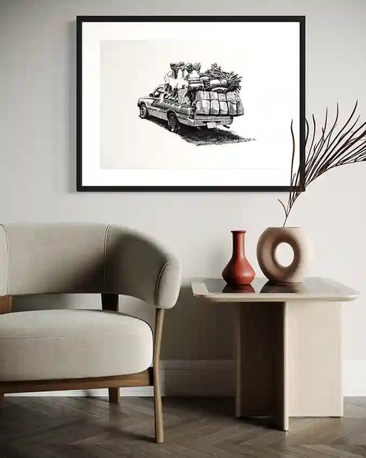 The Long Road art print by Obada Gabir displayed in modern living room with beige chair and minimalist decor