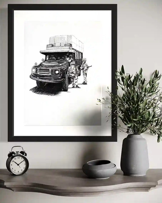 The Stop by Obada Gabir framed original ink painting mockup on wall with modern decor - Bedford truck checkpoint artwork