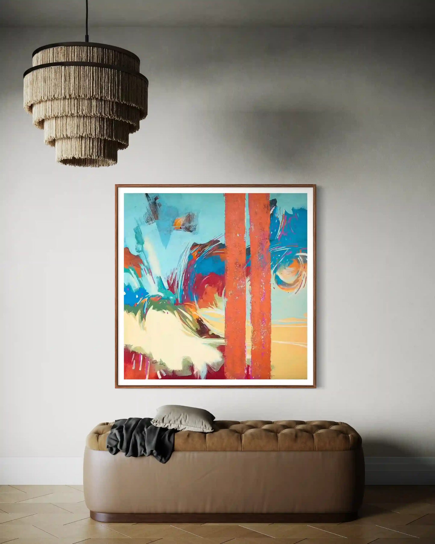 Within The City abstract art print displayed above tufted bench in modern bedroom with fringe chandelier and neutral decor