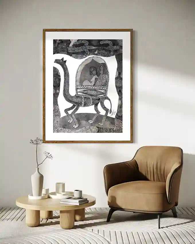 "The Caravan of Dreams" art print displayed above tan leather chair with round coffee table and ceramic vase.