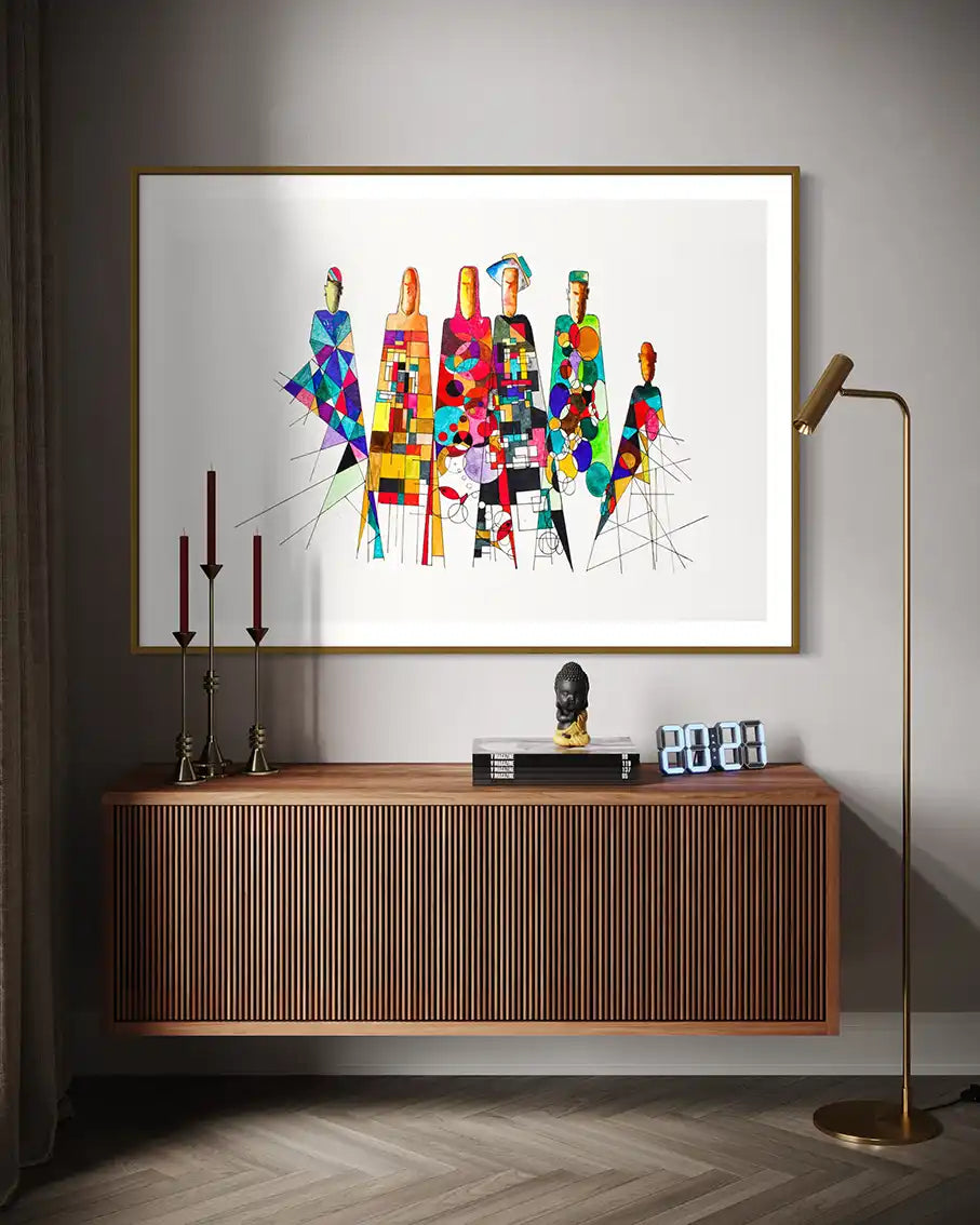 'Community Influences' art print by Sudanese artist Yousif Ibrahim on a wall above a wooden console table. UAE