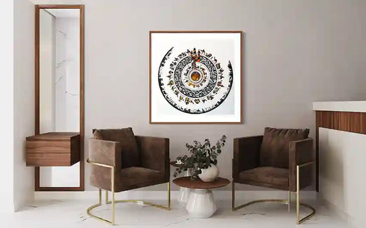 Modern living room with brown chairs, a coffee table, and decorative wall art print by Sudanese artist Yousif Ibrahim, in UAE