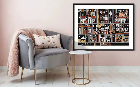 Framed collage art print 'Glimpses' on a wall above a gray armchair with a pink blanket and pillow. by artist Yousif Ibrahim