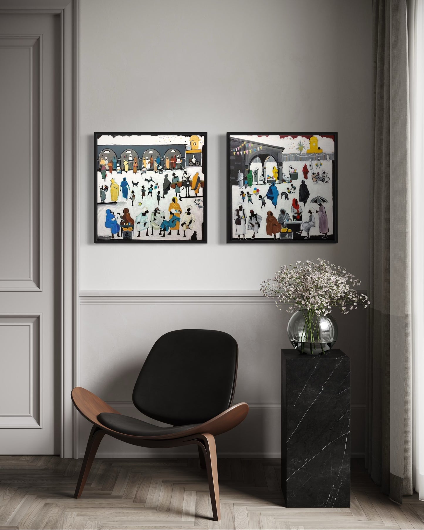 Modern room with black chair and artwork on a wall