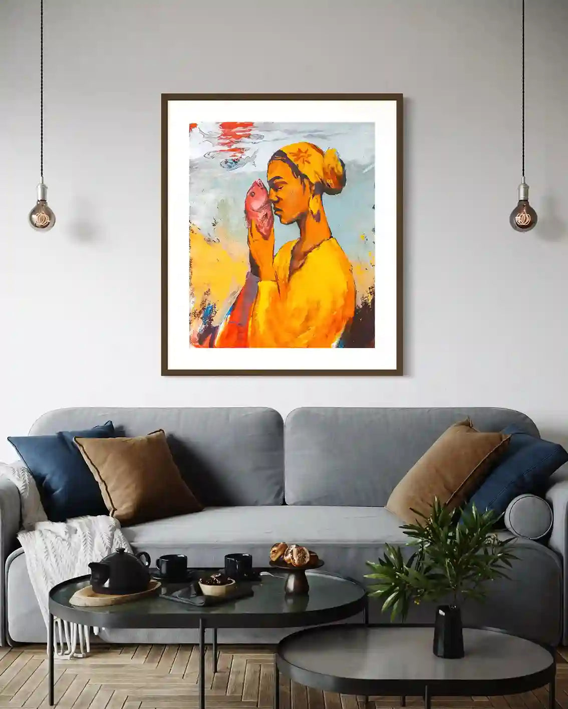 'Starring 3' by Bakri Moaz framed woman with fish art print in modern living room with gray sofa and pendant lighting