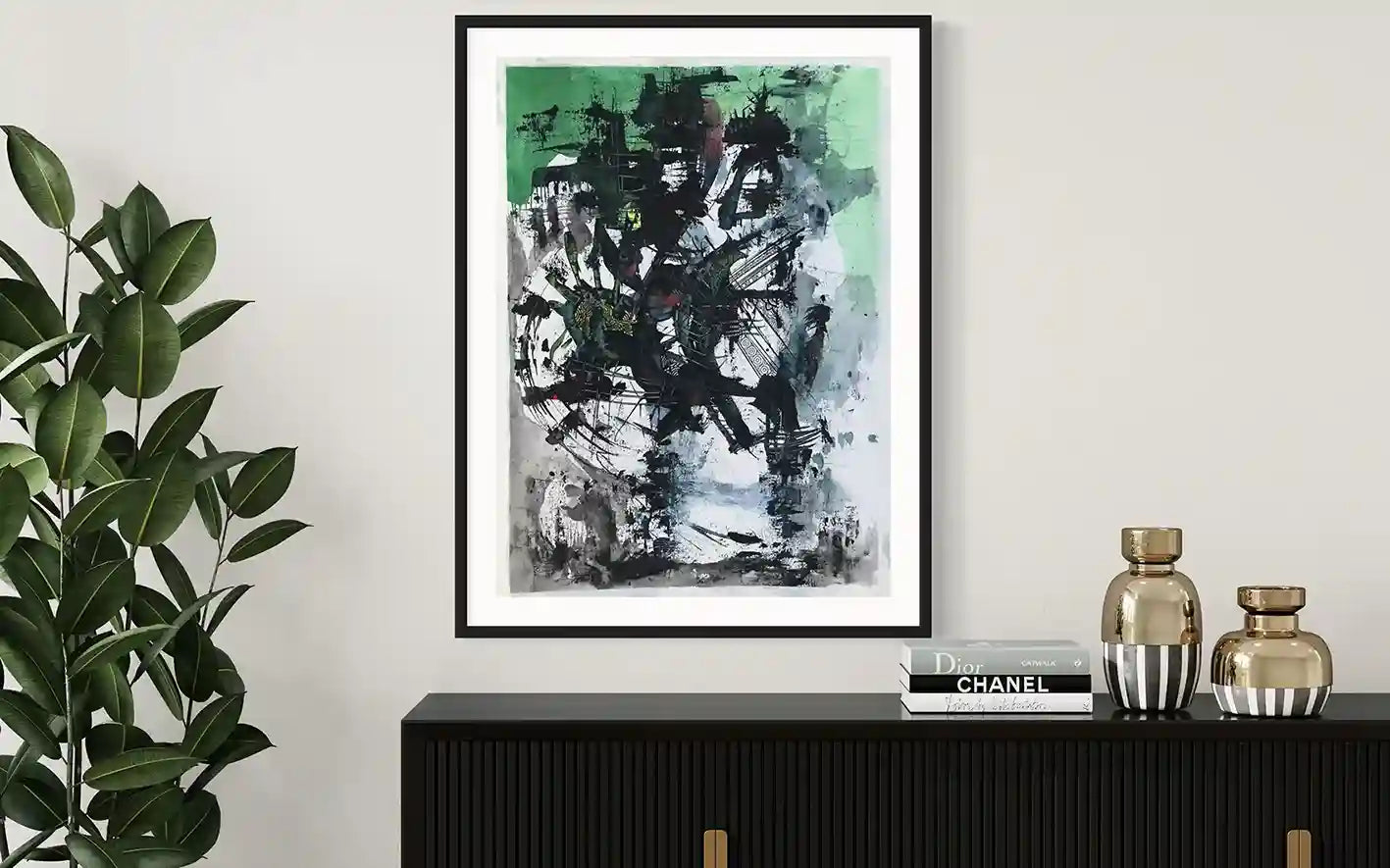 Green Truth painting by Samir Shareef in black frame above black console with plant and gold decor interior mockup