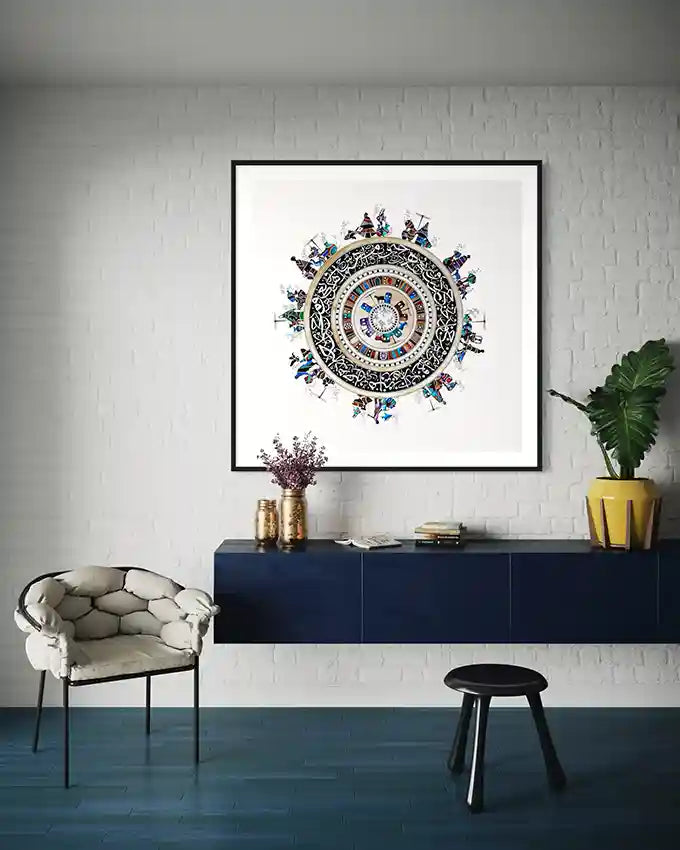 Cycle of Life 4 mandala art print by Gungalito in black frame on white brick wall above navy blue sideboard with plant