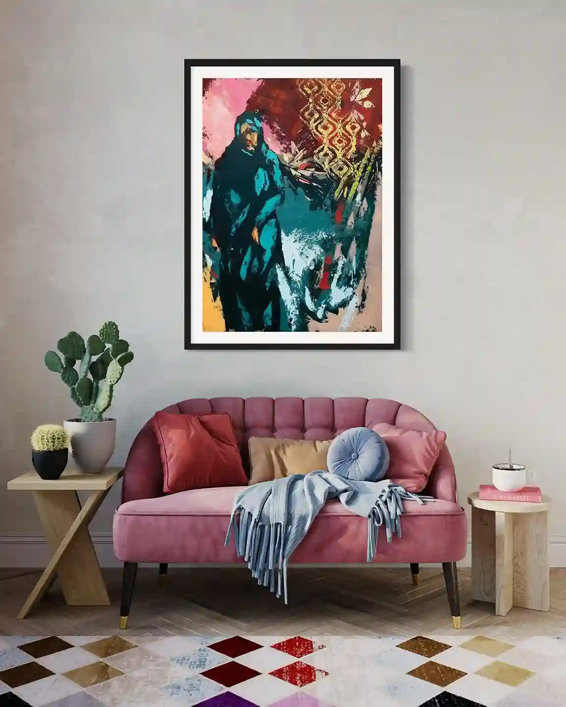 On The Way Back 6 art print by Bakri Moaz in black frame above pink velvet sofa with cacti and colorful geometric rug
