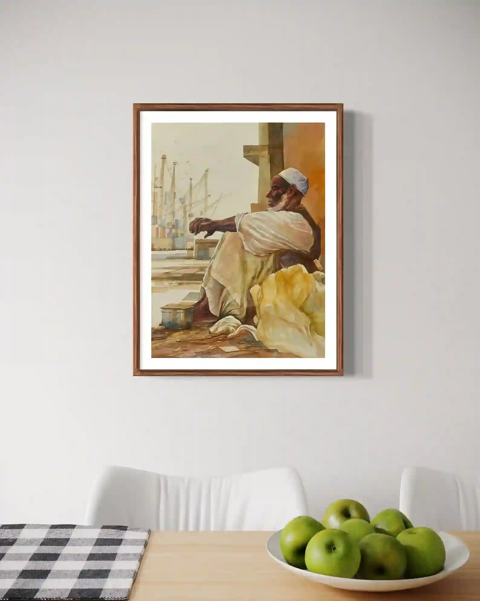 Port Reflections watercolor by Hussein Merghani framed mockup in kitchen interior with green apples and wooden table