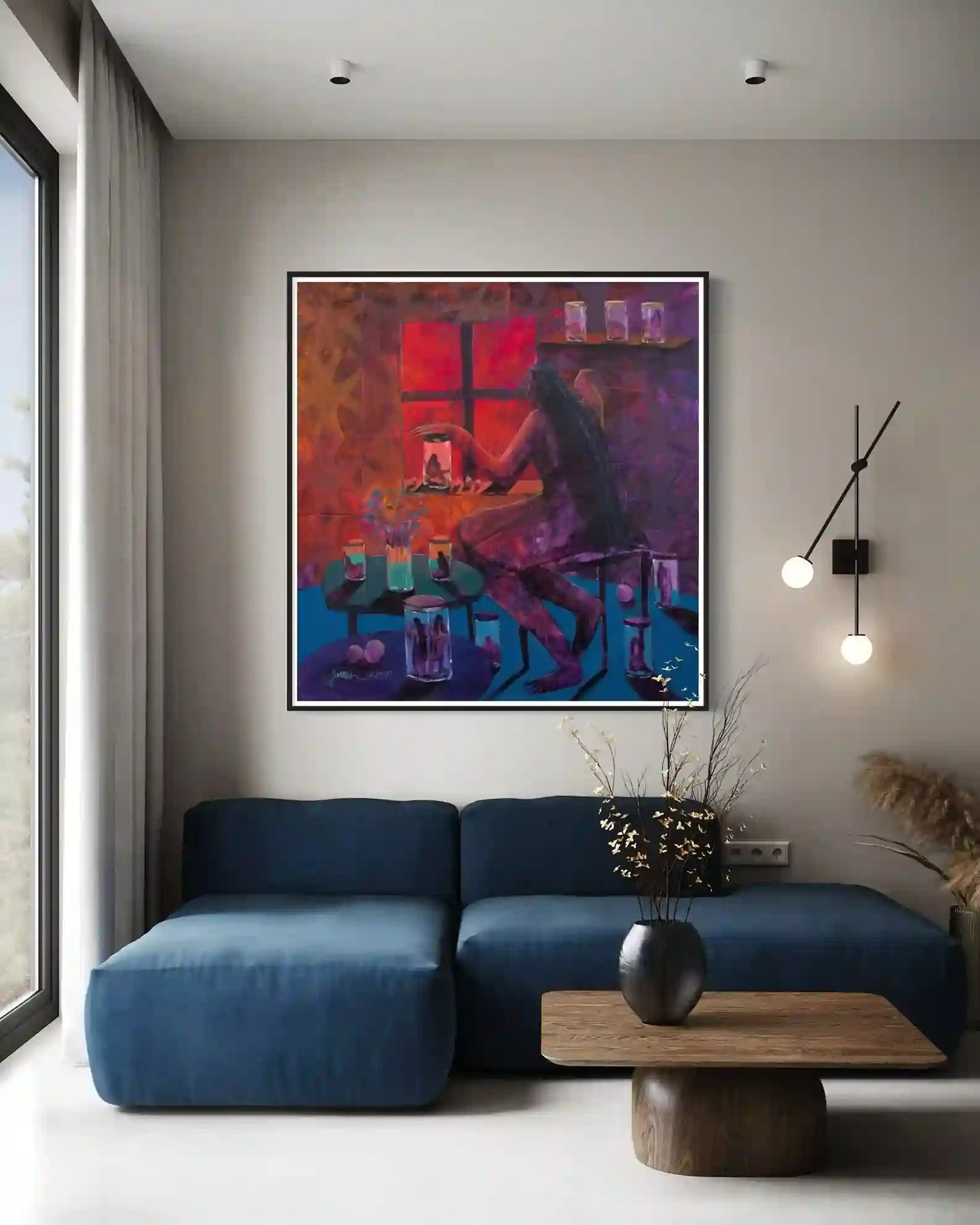 "They Placed Me In a Vessel" painting by Yasmeen Abdullah displayed in modern living room with blue sofa and minimal decor