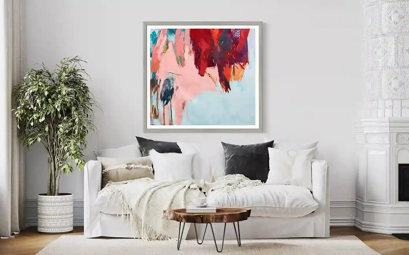 'To Nowhere 1' by Bakri Moaz art print mockup above white sofa in elegant living room with abstract pelican painting framed 